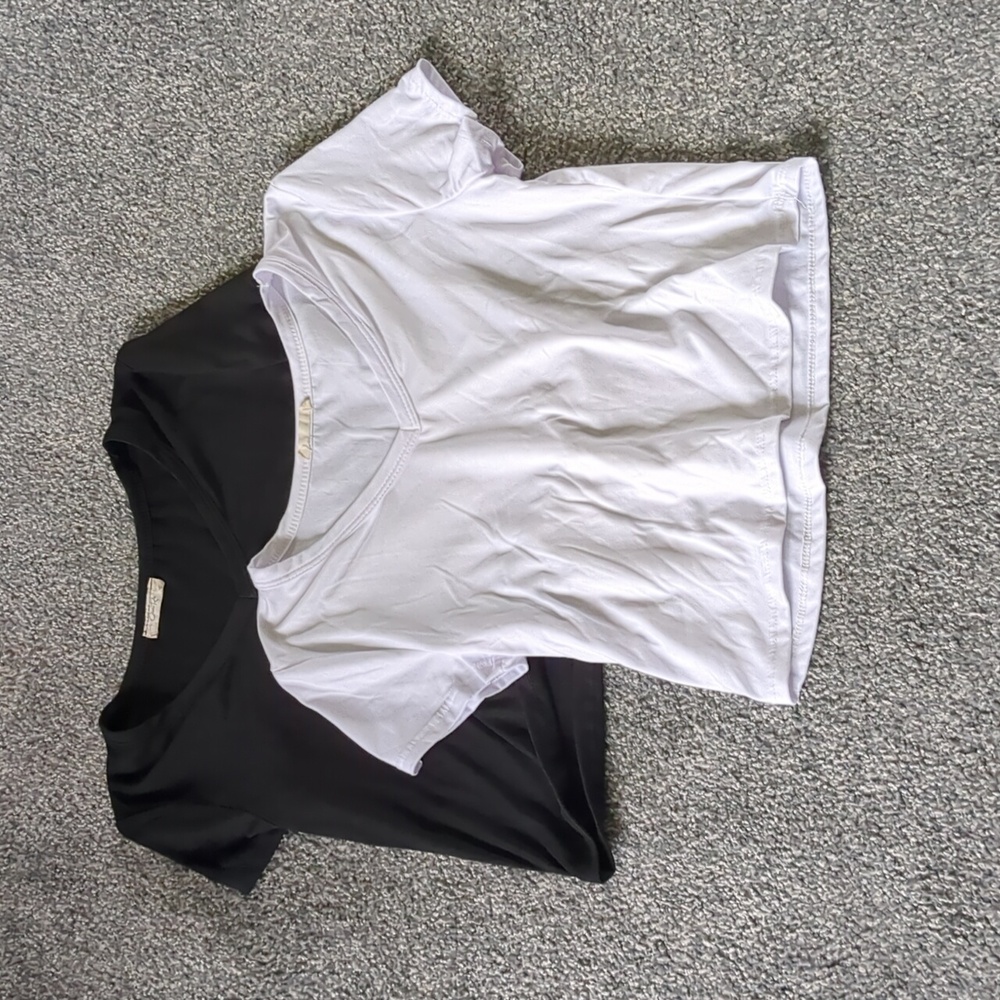 Two pack of cropped shirts size medium
